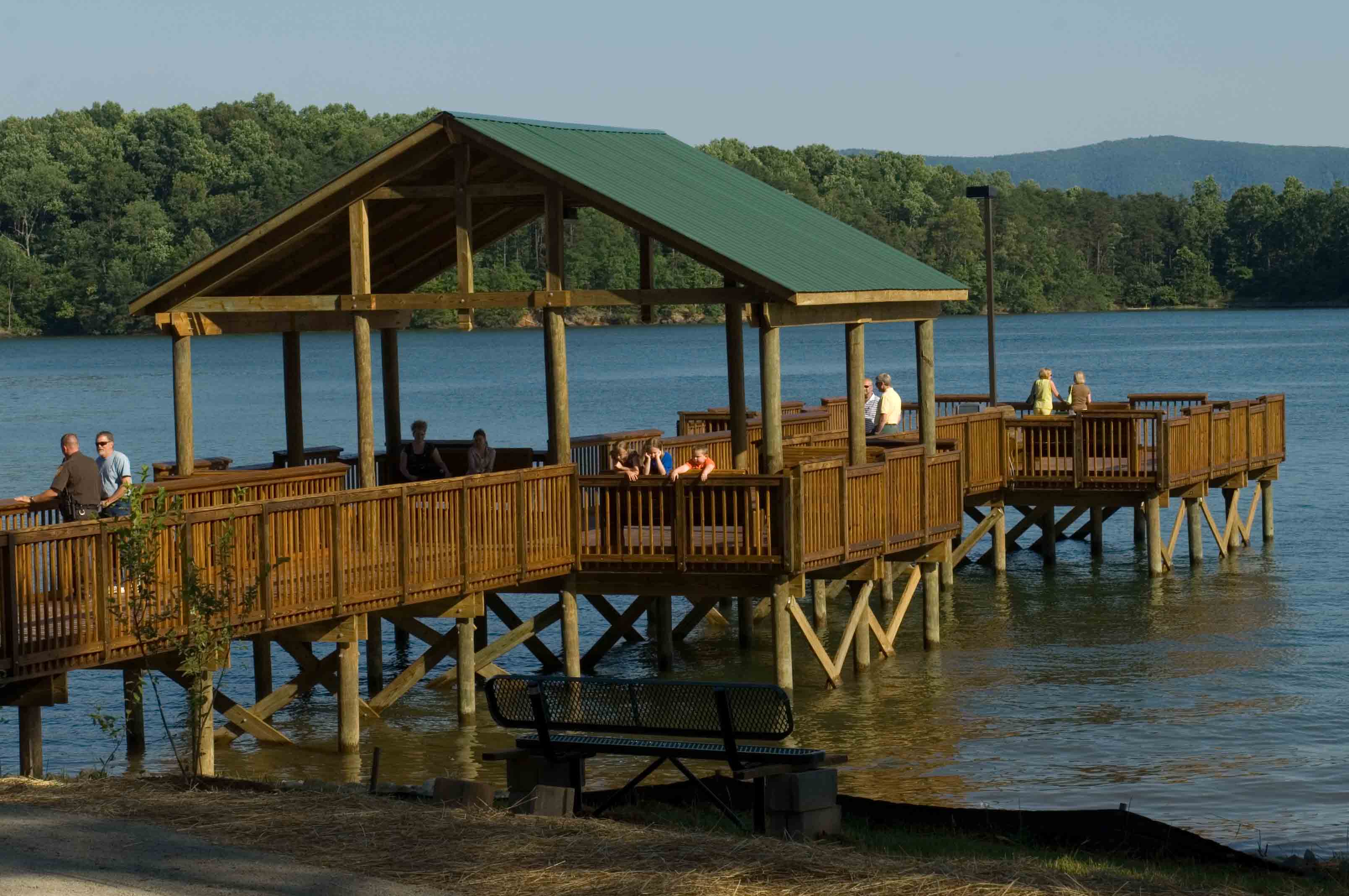 Wooden dock and pavilion extending over the water